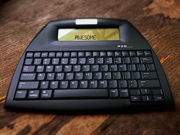 An electronic writing tool with a large keyboard and a small screen, the Alphasmart Neo
